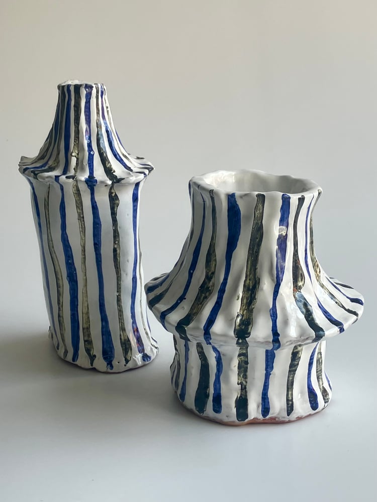 Image of two terracotta vessels