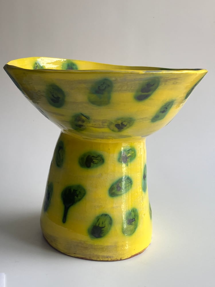 Image of yellow and green footed bowl