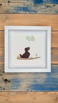 Seaglass dog , seaglass balloons and bird