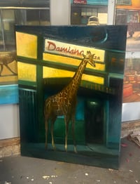 Image 2 of A Giraffe at Damiano’s 