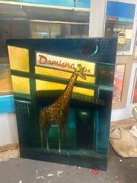 Image 3 of A Giraffe at Damiano’s 