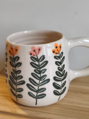 Image of   Petite  tasse anse fleur 