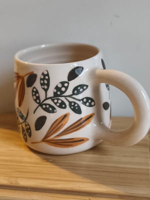 Image of   Petite  tasse anse feuillage brun