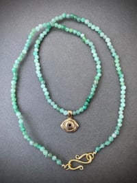 Image 1 of Averting Eye pendant on emerald strand 