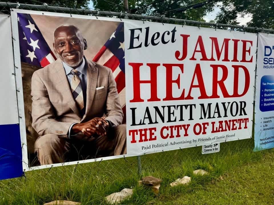 Image of Advertisement on our banner fence. 