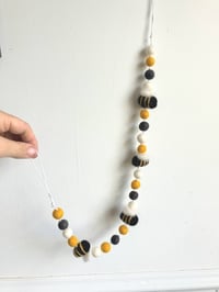 Image 1 of Bee and felt ball garland