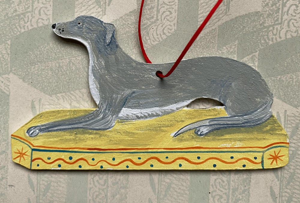 Image of Small dog decoration (B) left facing.