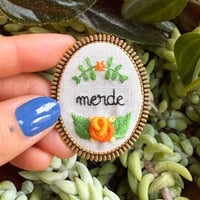Broche merde #1