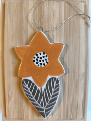 Image of    Suspension fleur beige 