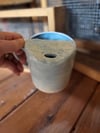 Pale blue travel mugs