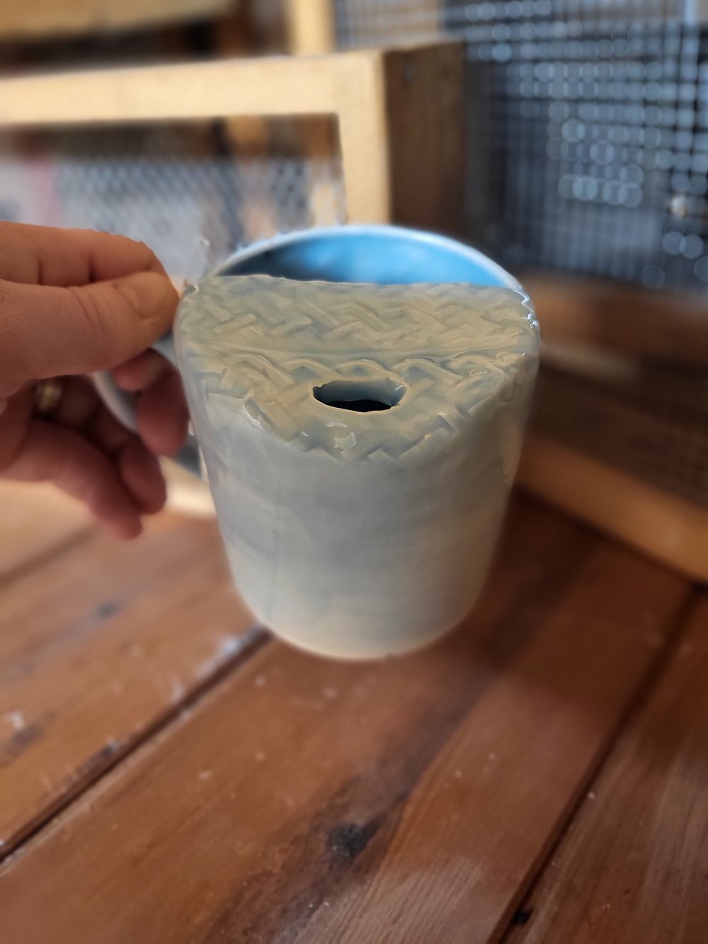 Pale blue travel mugs