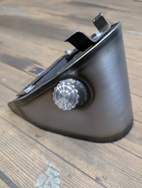 "High Capacity" Bolt-in horseshoe oil bag. 