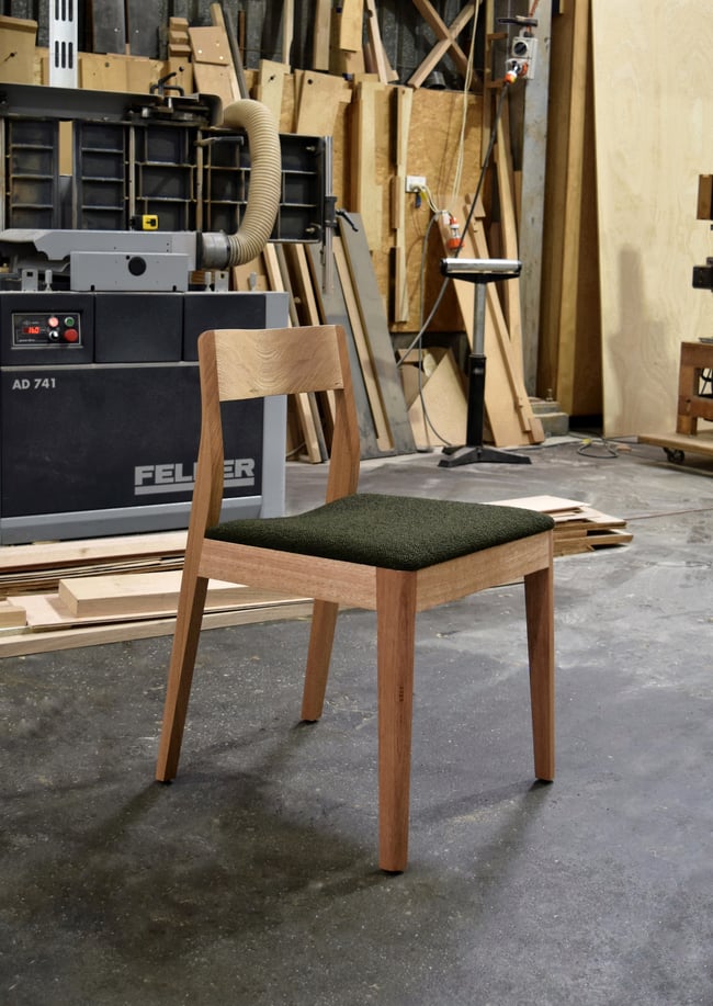  ROSE DINING CHAIR IN TASMANIAN OAK WITH AN UPHOLSTERED FABRIC SEAT