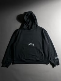 Image 1 of RISE THROUGH CHAOS “OVERSIZED” HOODIE IN BLACK