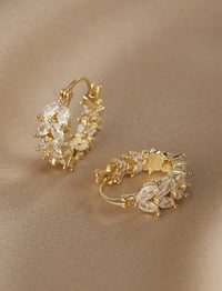 Image 1 of BIJOUX - 1 paire de boucles d'oreilles en forme de pointe de blé 