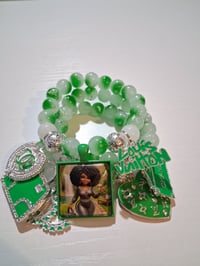 Image 3 of Saddie in green