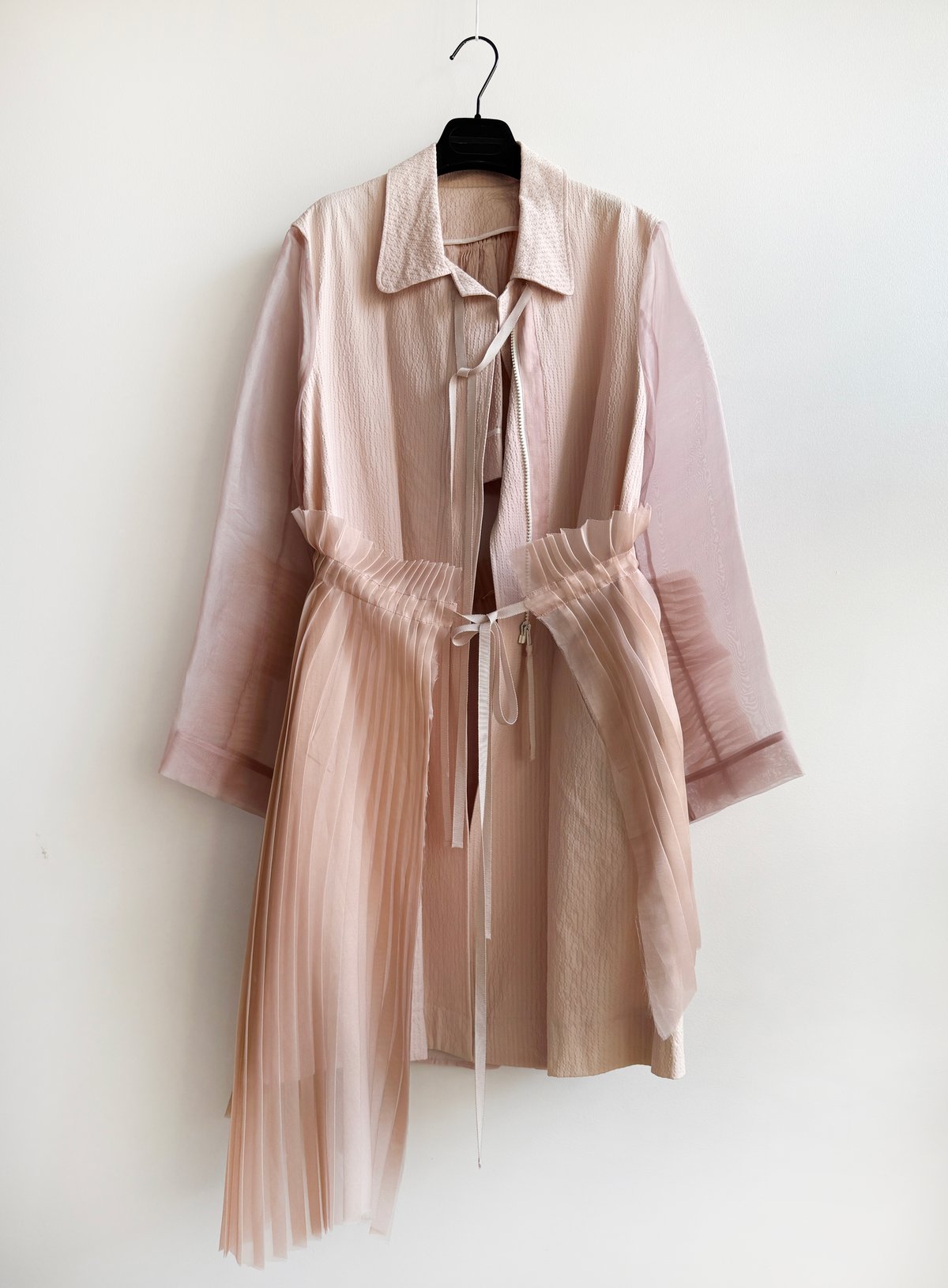 Prototype-bi-fabric pleated back overcoat