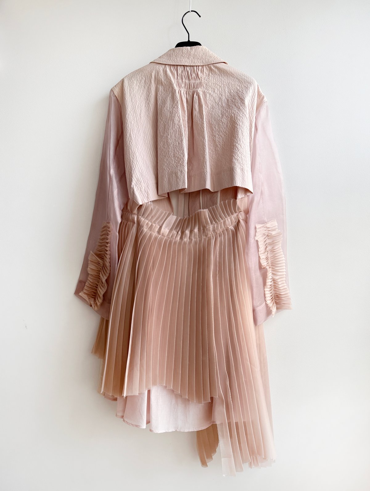 Prototype-bi-fabric pleated back overcoat