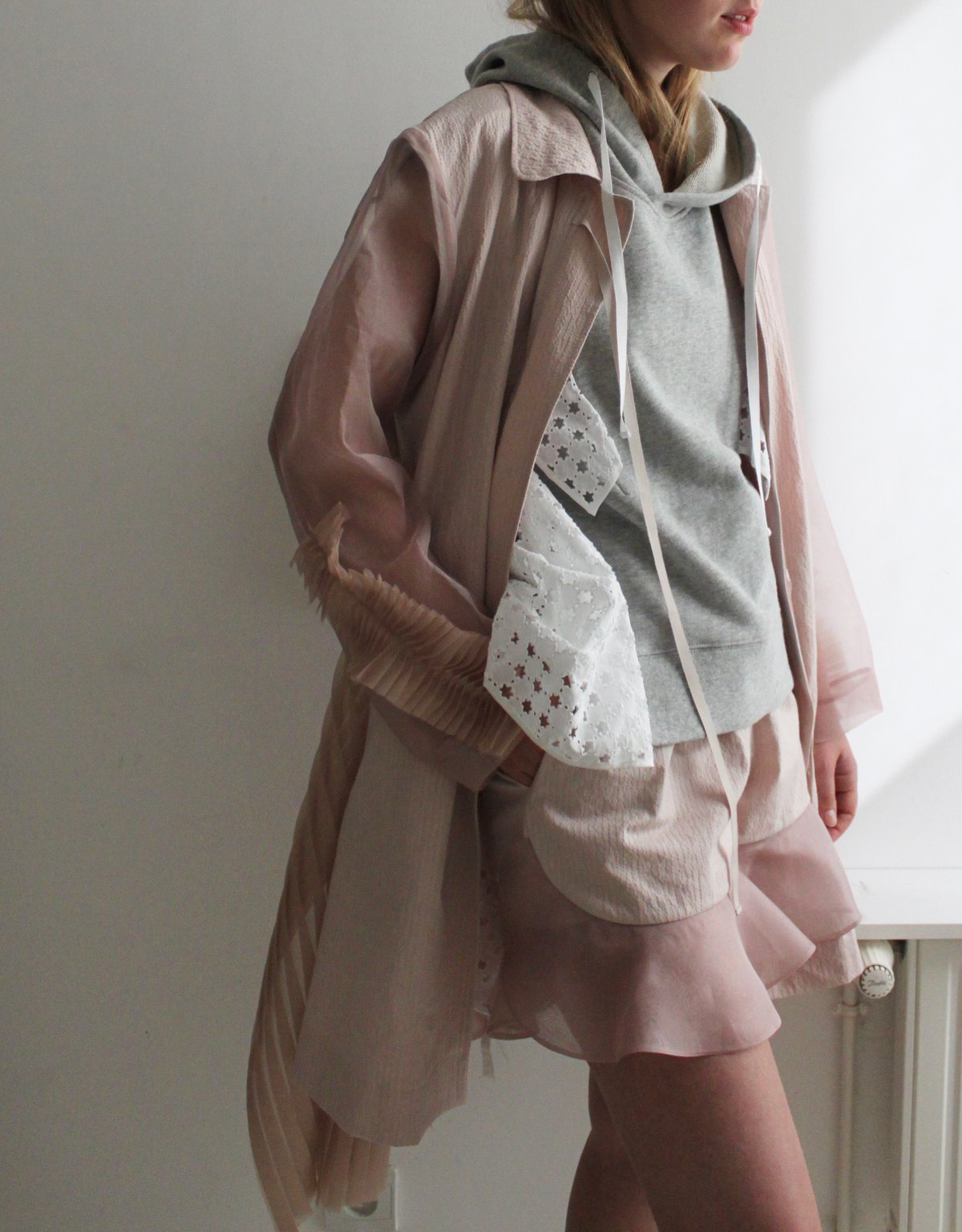 Prototype-bi-fabric pleated back overcoat