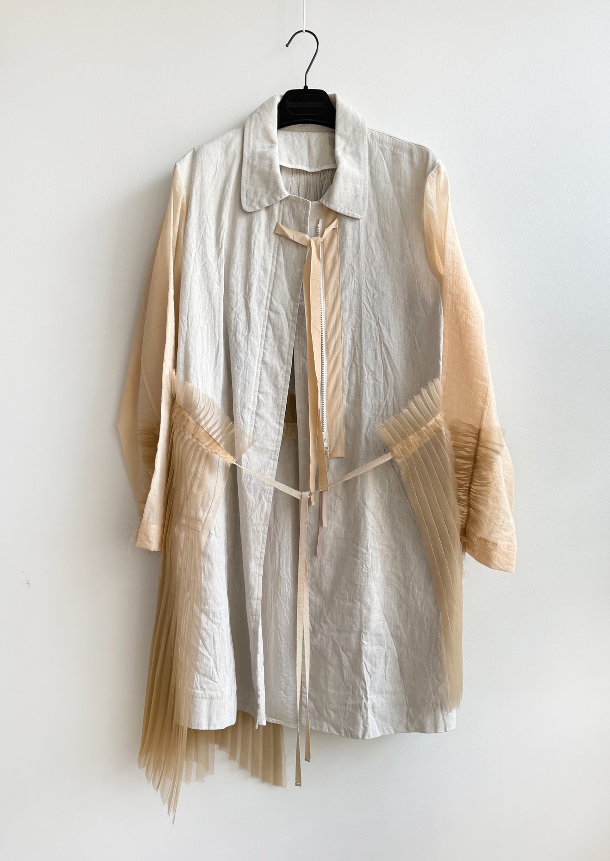 Prototype - bi-fabric pleated-back overcoat