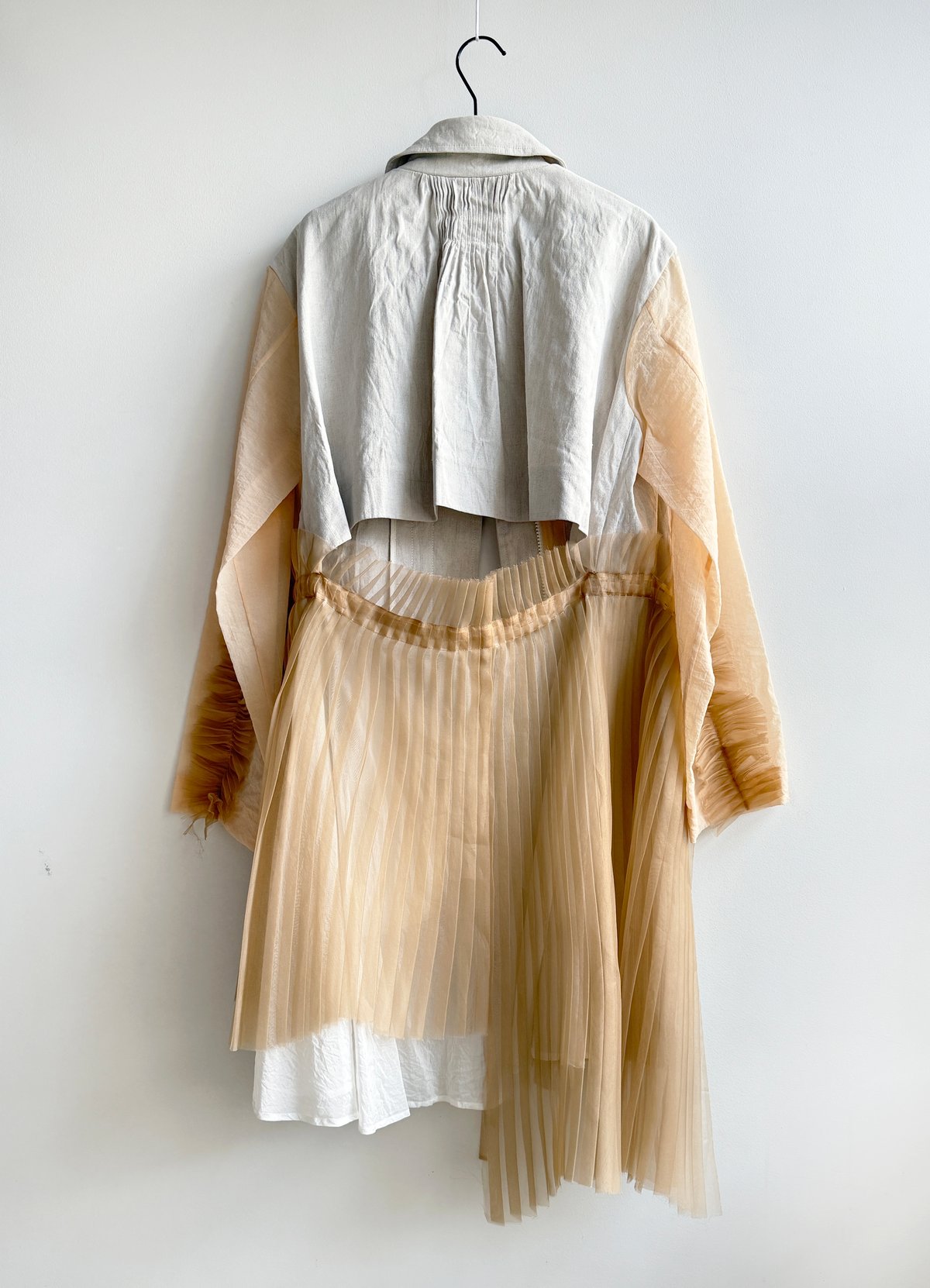 Prototype - bi-fabric pleated-back overcoat