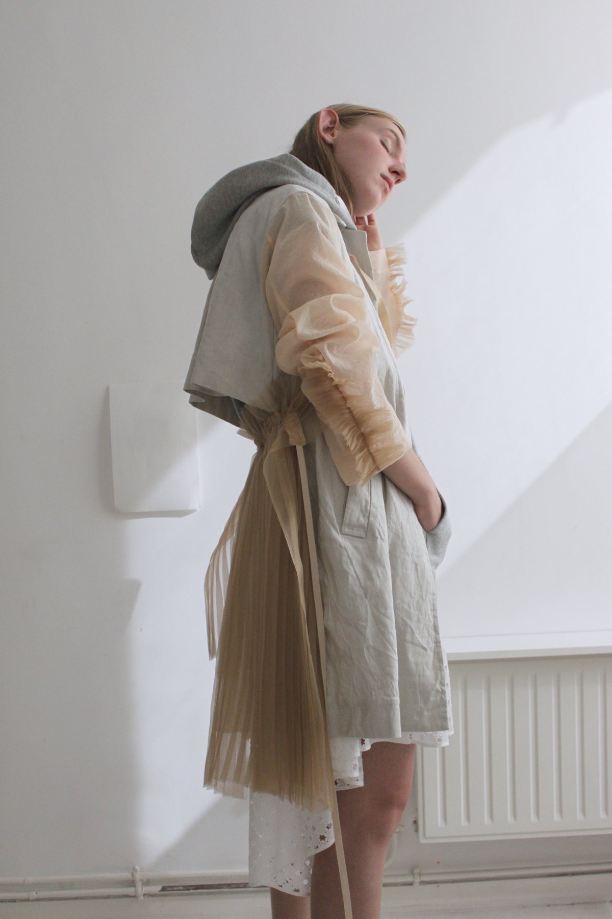 Prototype - bi-fabric pleated-back overcoat
