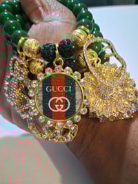 Image 2 of Green G in gold