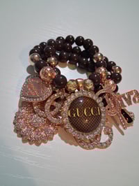 Image 1 of Brown G's