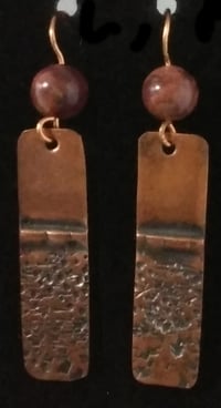 Fold-formed copper earring with jasper beads