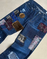 Image 4 of DISTRESSED PATCHWORK JEANS