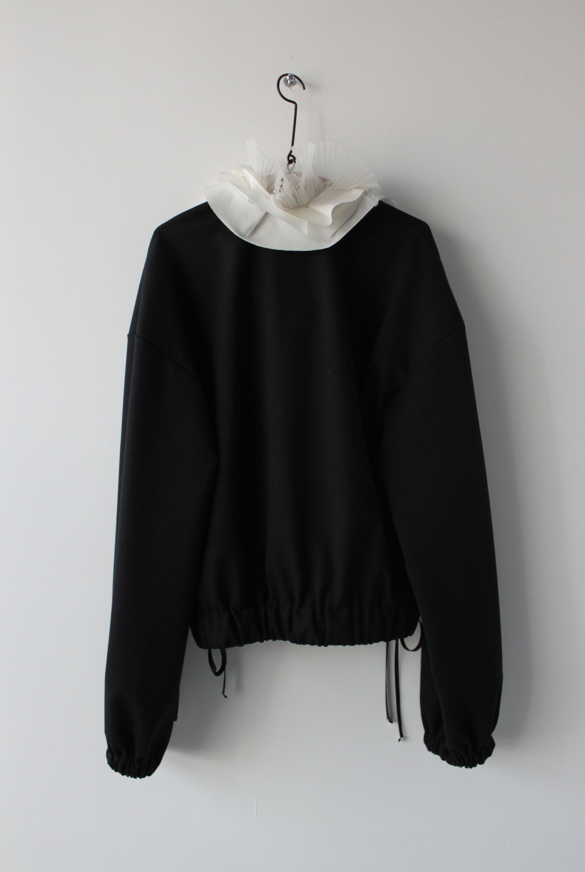 Prototype-ruffle collar pull over