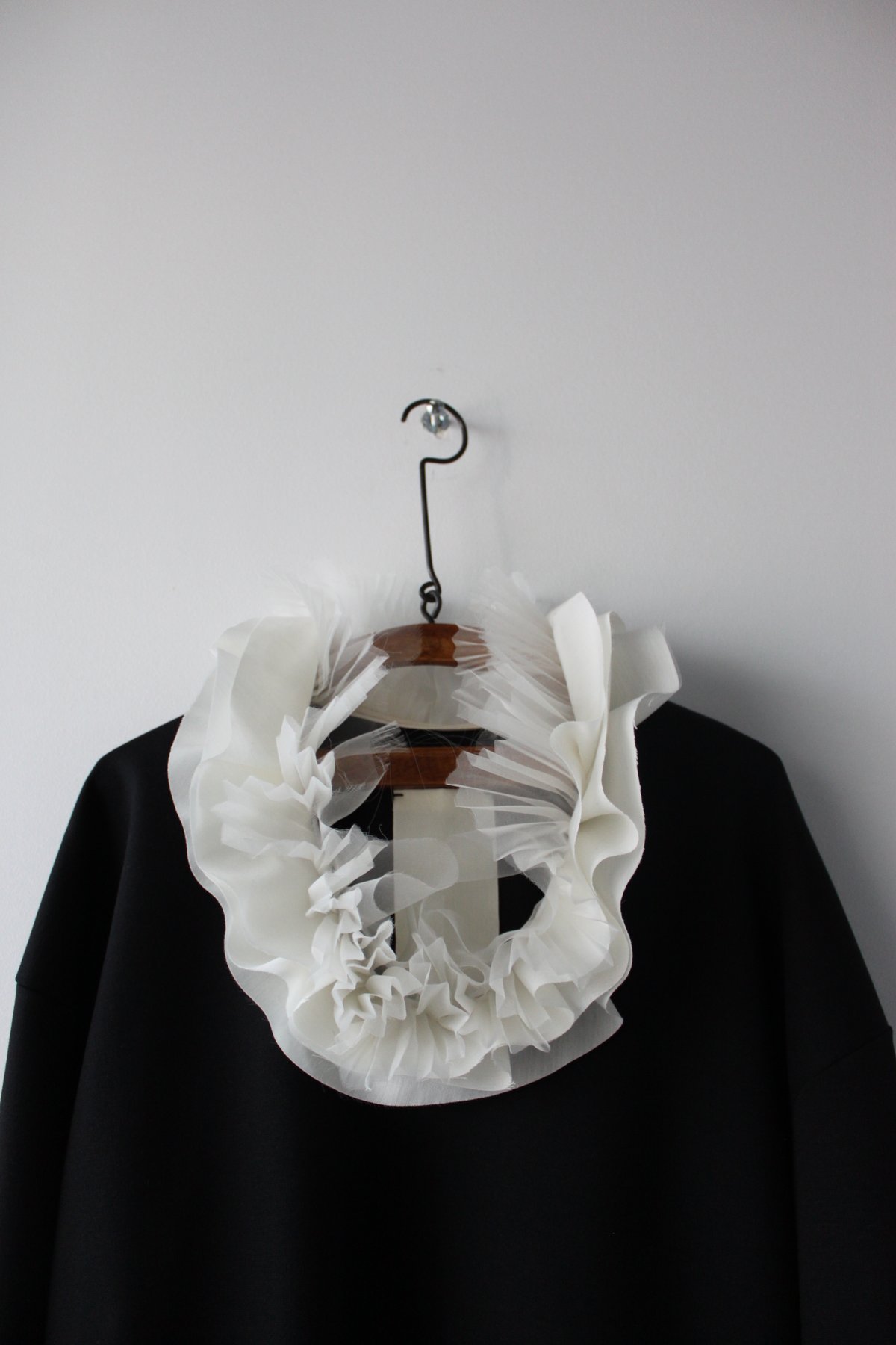 Prototype-ruffle collar pull over