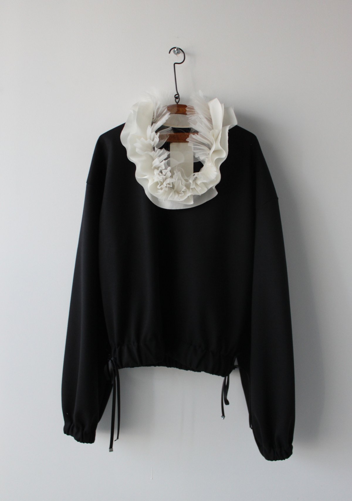 Prototype-ruffle collar pull over