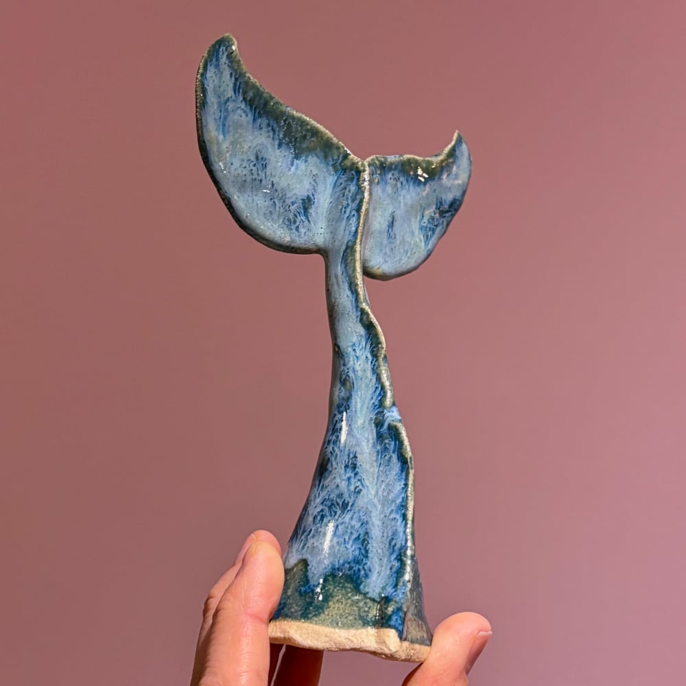 Image of Stormy whale tail