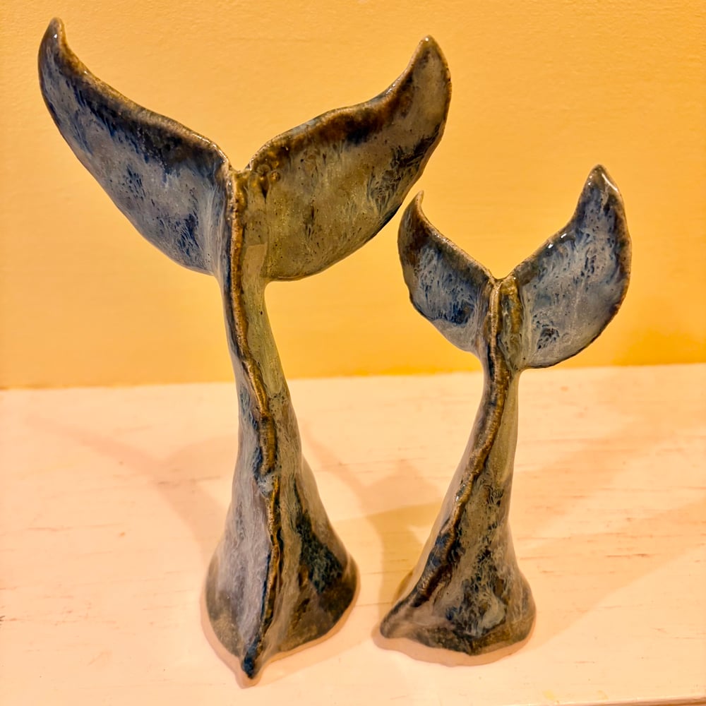 Image of Stormy whale tail