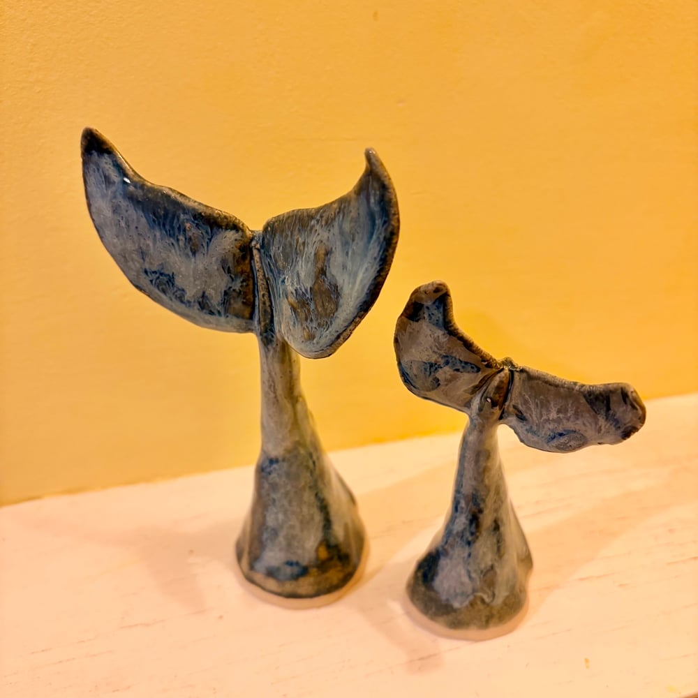 Image of Stormy whale tail