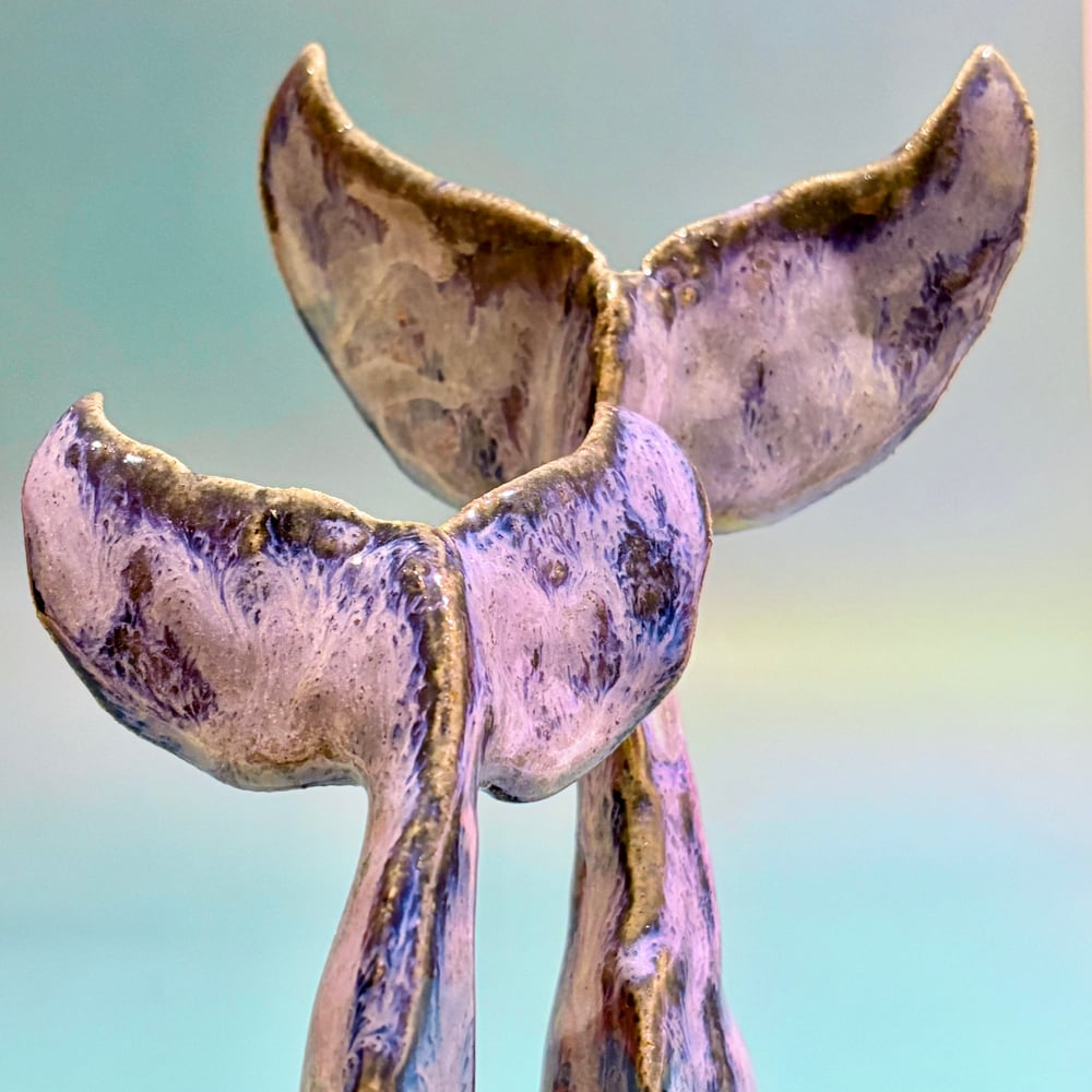 Image of Stormy whale tail