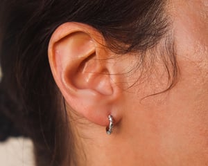 Image of 9ct White gold floral carved hoop earrings