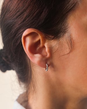 Image of 9ct White gold floral carved hoop earrings