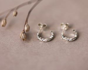 Image of 9ct White gold floral carved hoop earrings