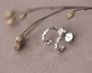 Image of 9ct White gold floral carved hoop earrings