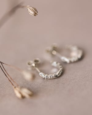 Image of 9ct White gold floral carved hoop earrings