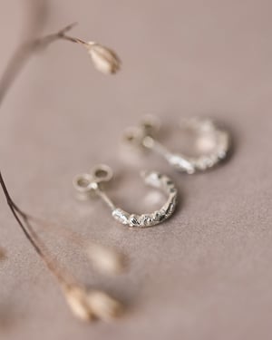 Image of 9ct White gold floral carved hoop earrings