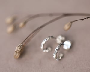 Image of 9ct White gold floral carved hoop earrings