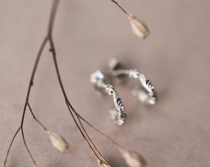 Image of 9ct White gold floral carved hoop earrings