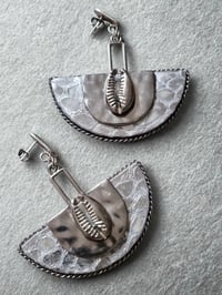 Image 1 of Cold Cowrie Shell 