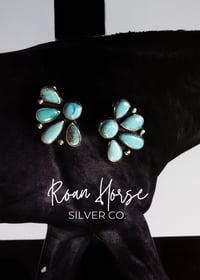 Half cluster earrings