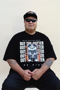 Image 1 of OUT THE GUTTER WE RISE T SHIRT