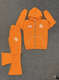 Purpose built orange sweat suit 