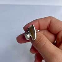 Image 1 of AMBER/PEARL SIREN RING (O ½)